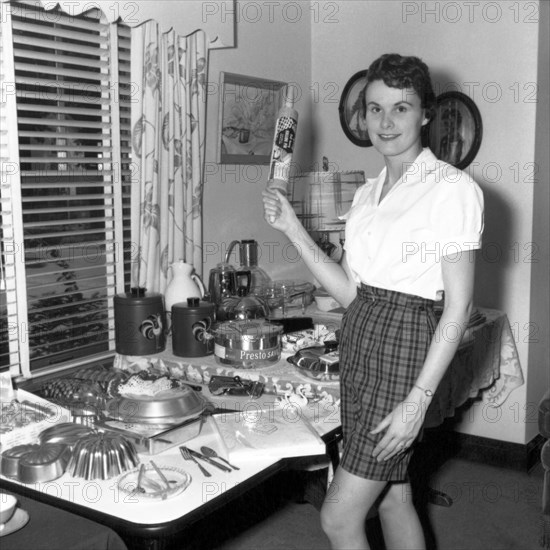 A Woman Holding A Rolling Pin Photo12 Underwood Archives UIG