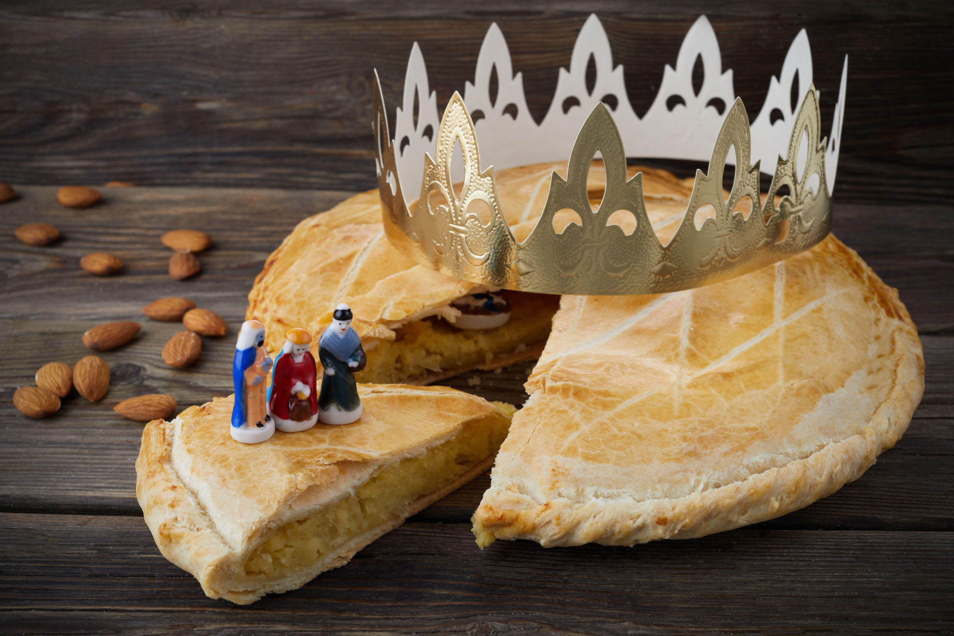 Epiphany cake, French Galette de rois with figure of three kings.