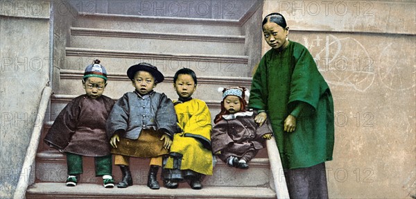 Photomechanical print of a Chinese family in America