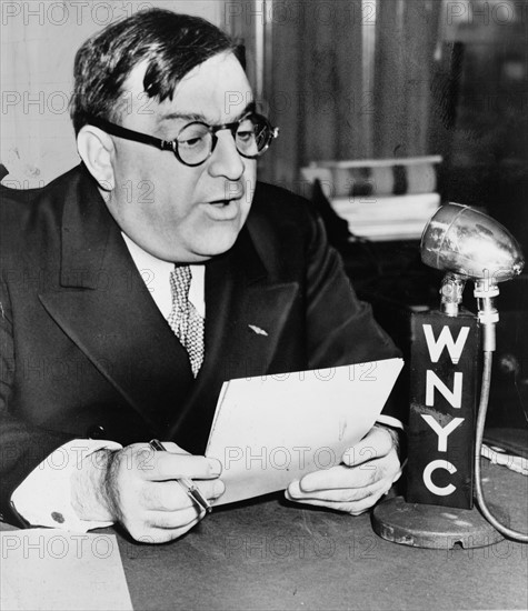 New York Mayor Fiorella La Guardia speaks over WNYC on Grade A milk from Budget Room.