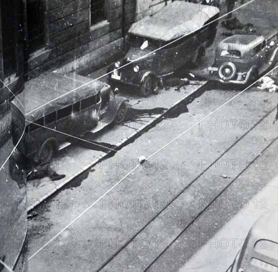 casualties and injured lie on the streets during the Siege of Gijón, in the Spanish Civil War