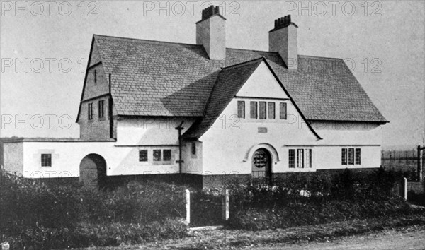 Photograph of the exterior of a Voysey House in Beaconsfield