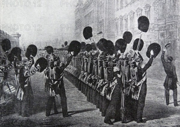 Scots Guards cheer the Queen of Great Britain