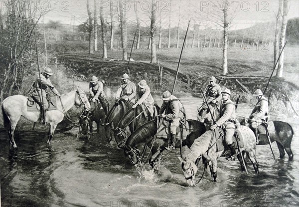 French cavalry horses drink at a river