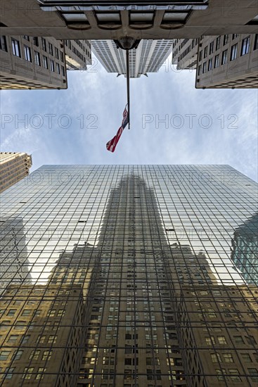 Chrysler Building reflected in Grand Hyatt Hotel