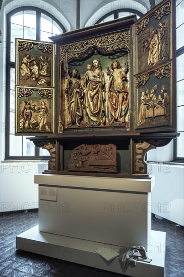 Altarpiece with wing reliefs