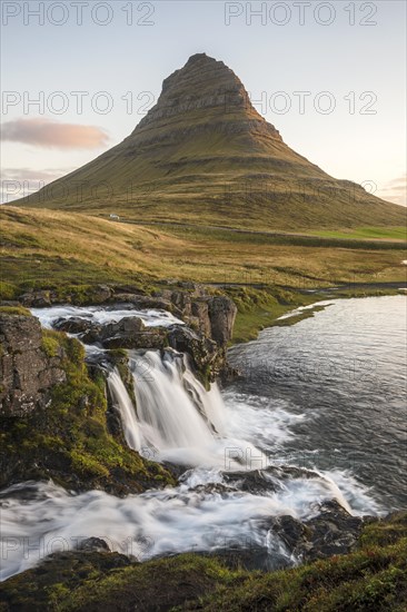 Sunrise on Kirkjufell mountain with waterfall Kirkjufellfoss