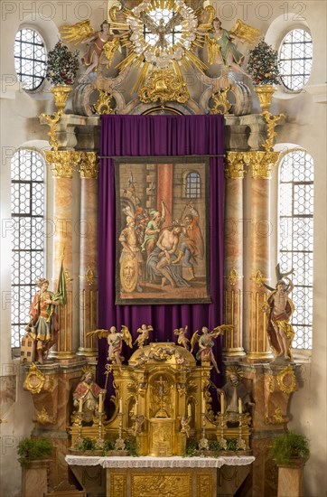 Restored Lent scarf hangs in church above altar