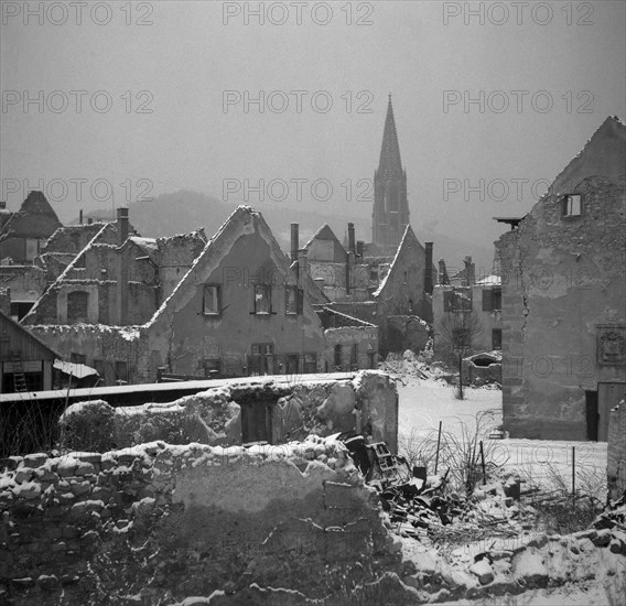Ruins of destroyed houses in the snow