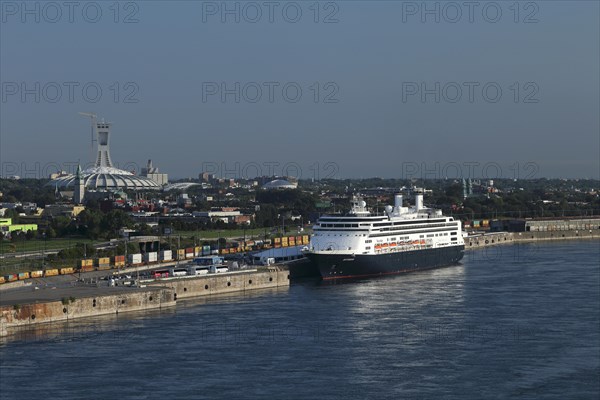 Cruise ship Rotterdam with Olympic Stadium behind