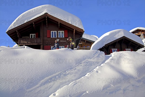 Chalets with deep snow in the village