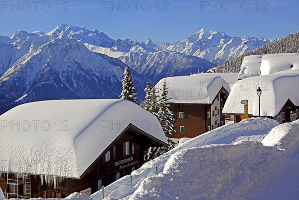 Chalets with deep snow in the village