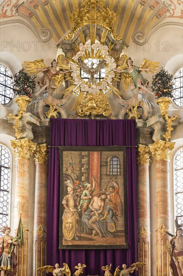 Restored Lent scarf hangs in church above altar