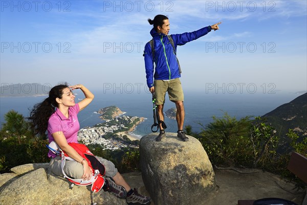 Hikers look out