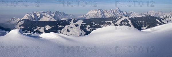 Panorama from Schattberg mountain in winter with Loferer Steinbergen