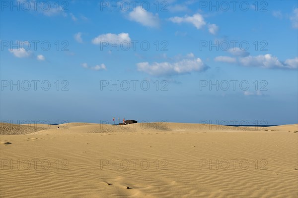 Sand dunes and blue sky