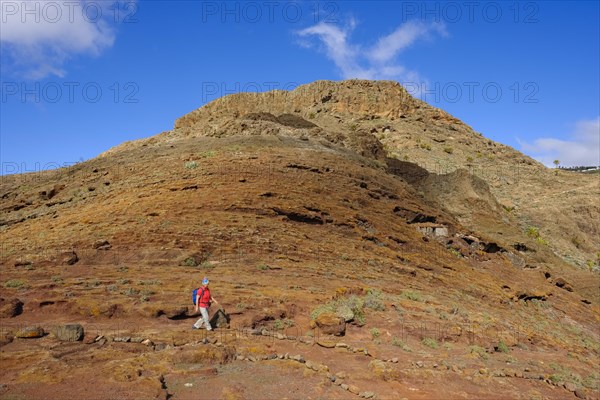 Woman hiking on trail