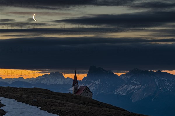 Latzfonser Kreuz Chapel at the Blue Hour with Crescent and South Tyrolean mountains