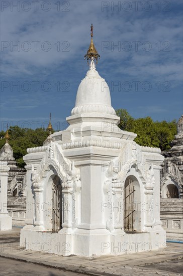 White kyauk gu cave stupa at Kuthodaw Pagoda