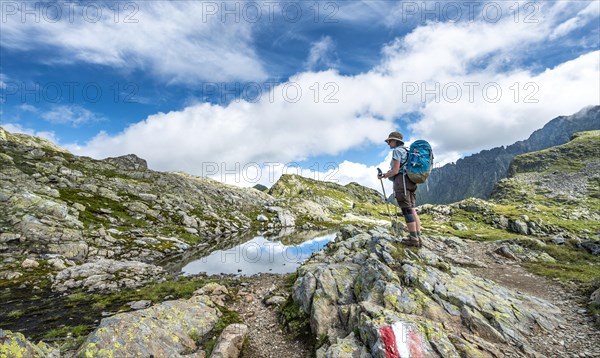 Hiker at a small lake