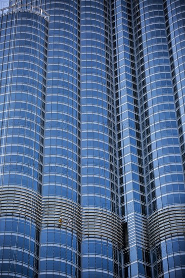 Window cleaners on glass facade of Burj Khalifa