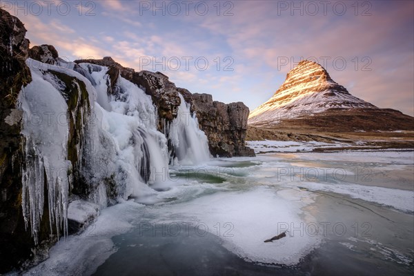 Mount Kirkjufell with Kirkjufellfoss waterfall