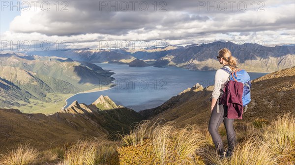 Female hiker looking at lake