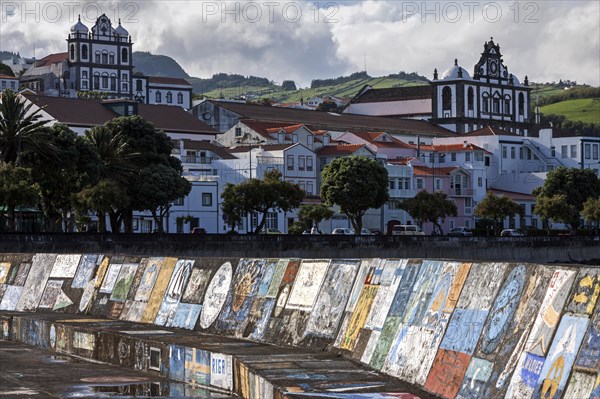 Harbour wall painted by sailors