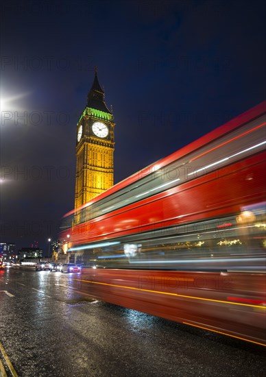 Red double-decker bus in front of Big Ben