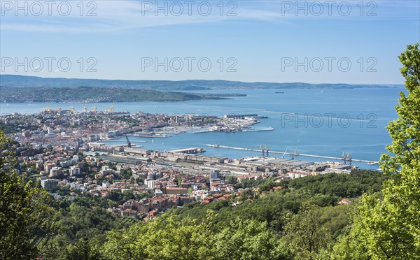 View from the panoramic path Strada Vicentina or Strada Napoleonica at the Karst plateau of the port and Gulf of Trieste