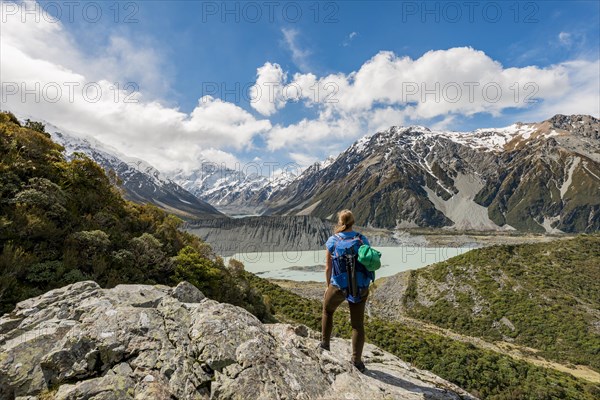 Hiker standing on rocks