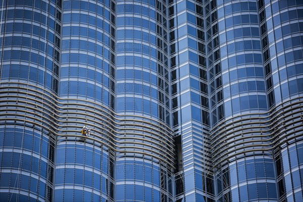 Window cleaners on glass facade of Burj Khalifa