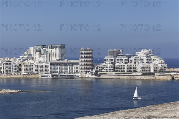 Spit of land with office and apartment buildings