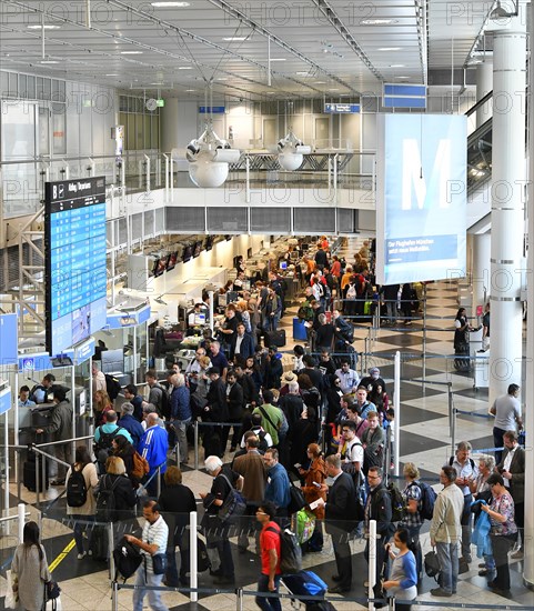 Passengers in front of security check