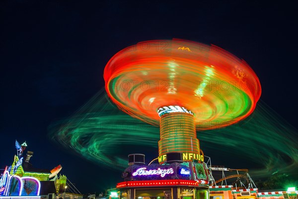 Swings carousel in motion