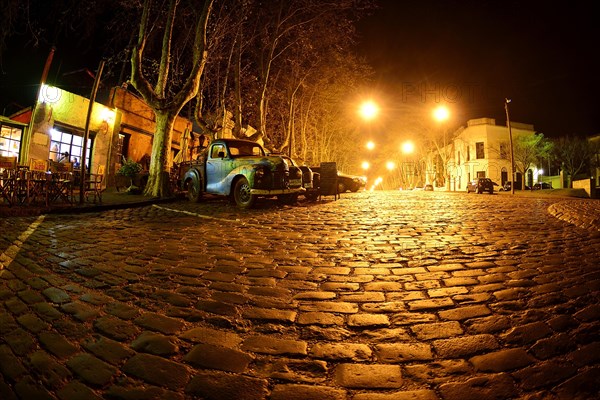 Oldtimer cars on cobblestone street