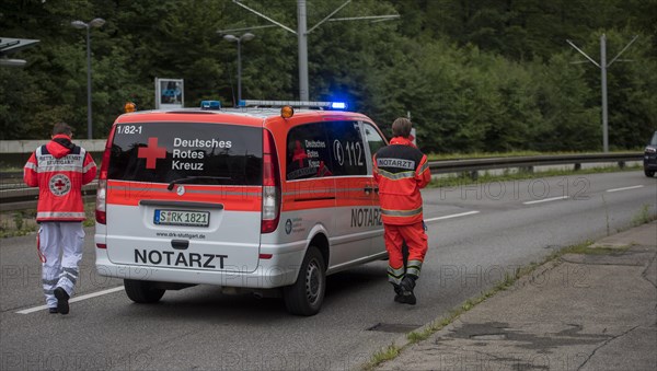 Emergency doctor in his emergency vehicle on the street