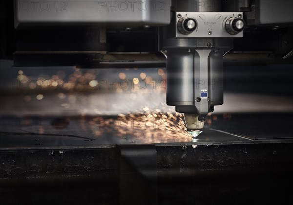 Laser cutter machine with sparks