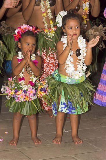 Little girls decorated with flowers