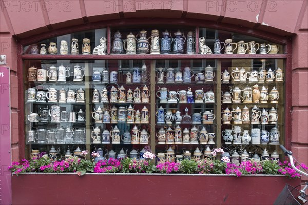 Collection of steins in window of restaurant Kobenhavneren in Helsingor