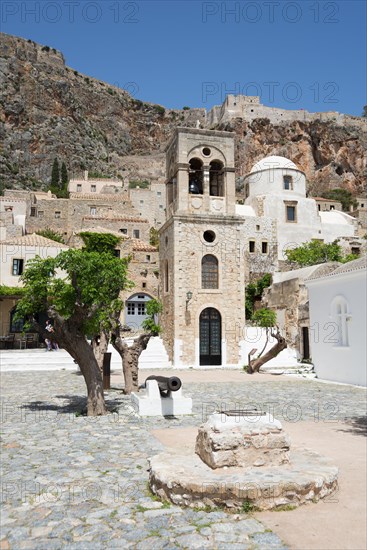 Main square with bell tower of the Byzantine Greek Orthodox church Christos Elkomenos