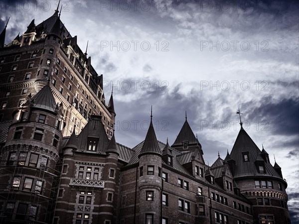 Chateau Frontenac castle rooftops in twilight