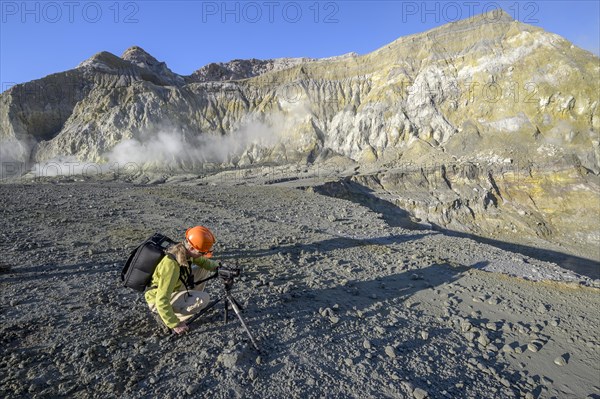 Camerawoman on the volcanic island White Island