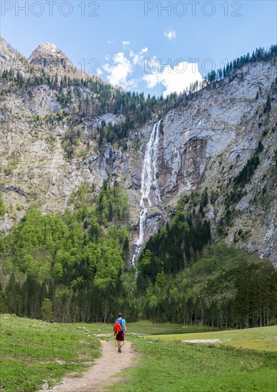 Hiker on way to Rothbach Waterfall