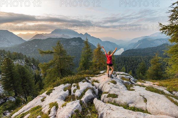 Hiker looks at mountain panorama