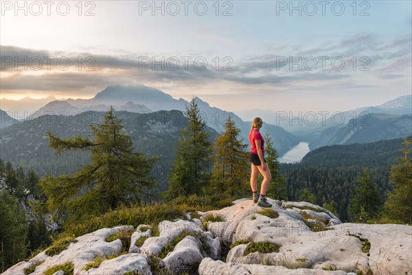 Hiker looks at mountain panorama