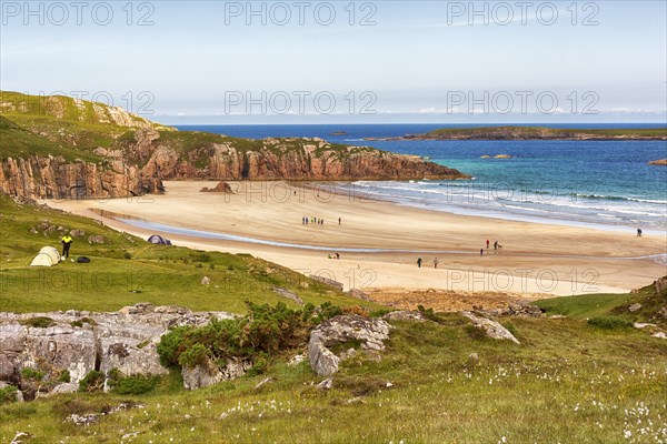 Bay with rocks and sandy beach