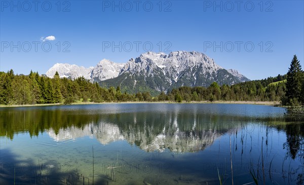 Western Karwendelspitze reflected in Lake Luttensee