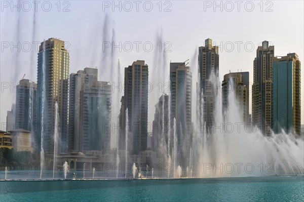 Fountains in front of skyscrapers