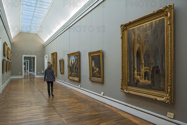 Exhibition room with paintings